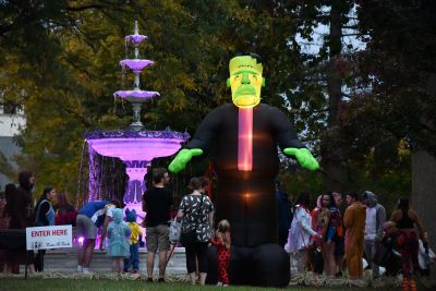 Oversized inflatable Frankenstein near the a water fountain