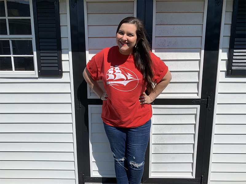 Leah Fuoco wearing a red shirt with Shippensburg University logo
