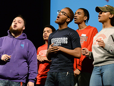 four Students singing