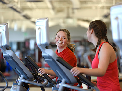 Student on elliptical trainer