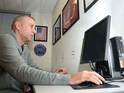 Veteran at computer