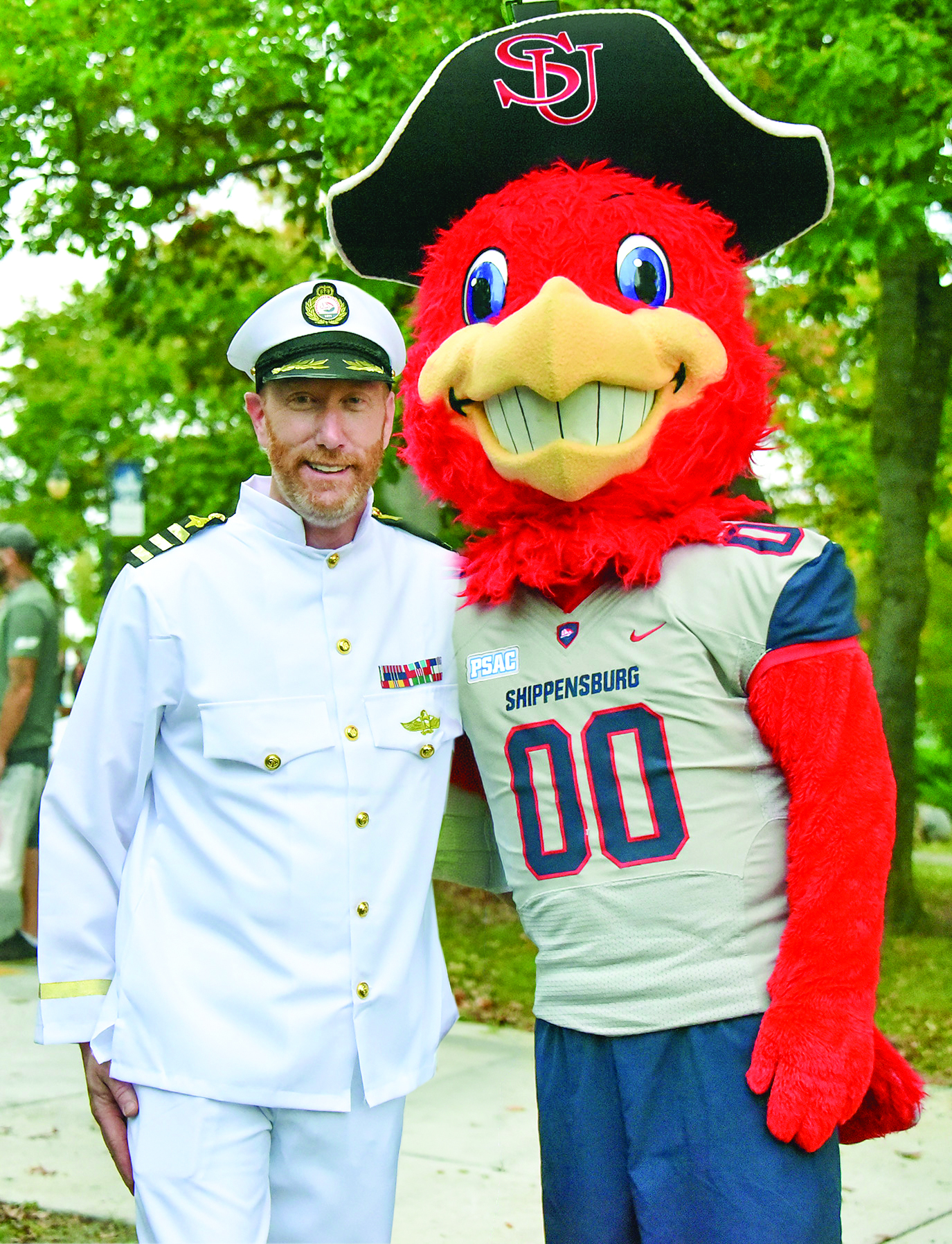President Charles Patterson with Big Red in Sailor Costume