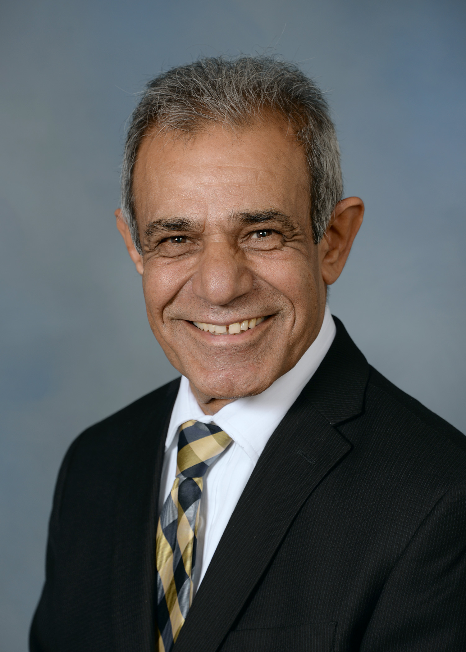 Dr. John G. Kooti