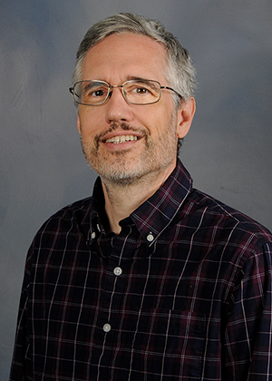 Dr. Dudley Girard, Professor 