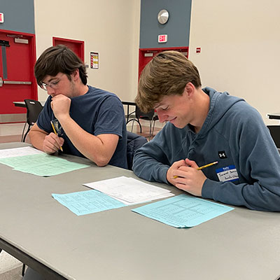 two students at table